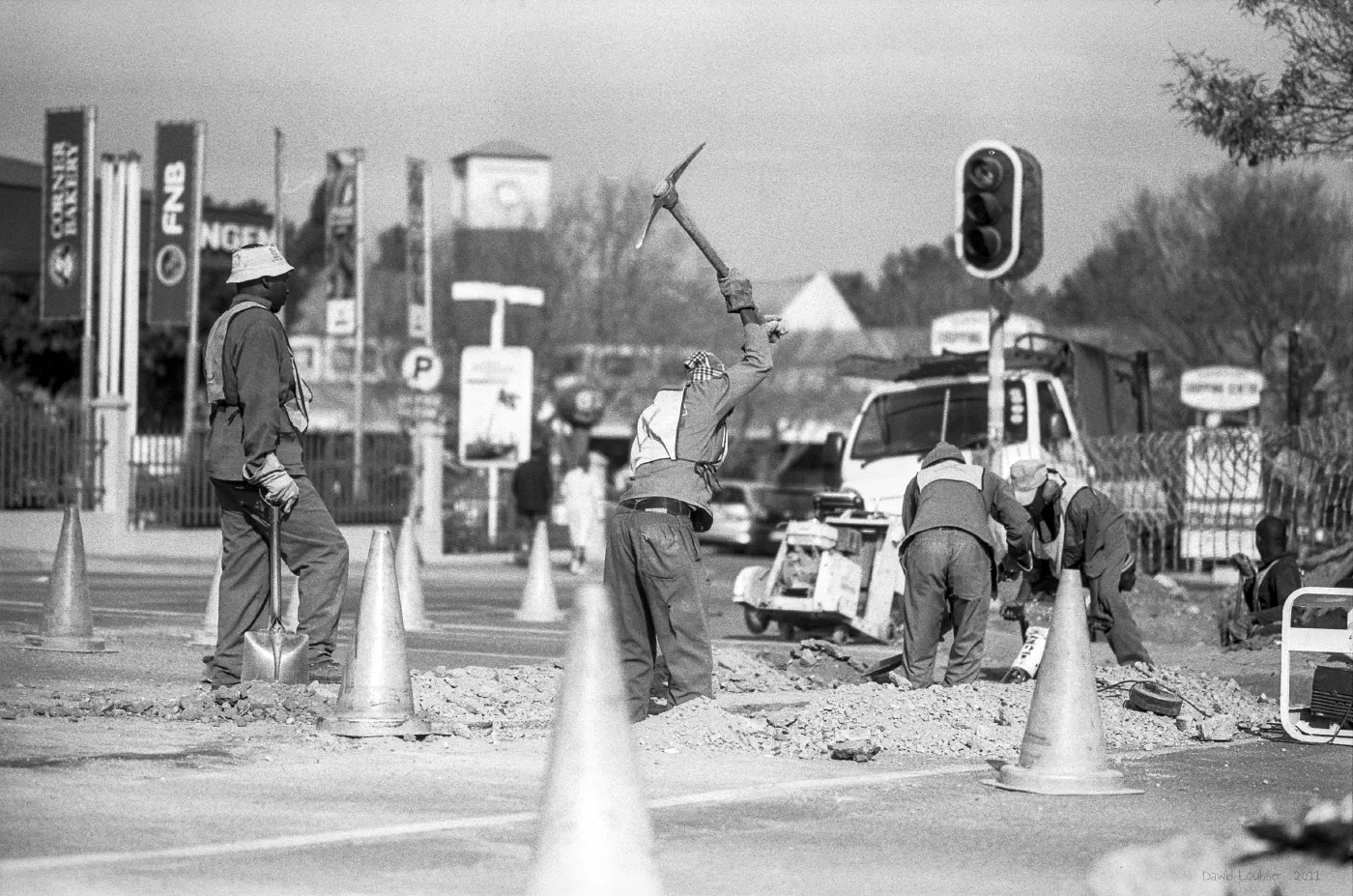 Road workers, Johannesburg, on black and white film by Dawid Loubser